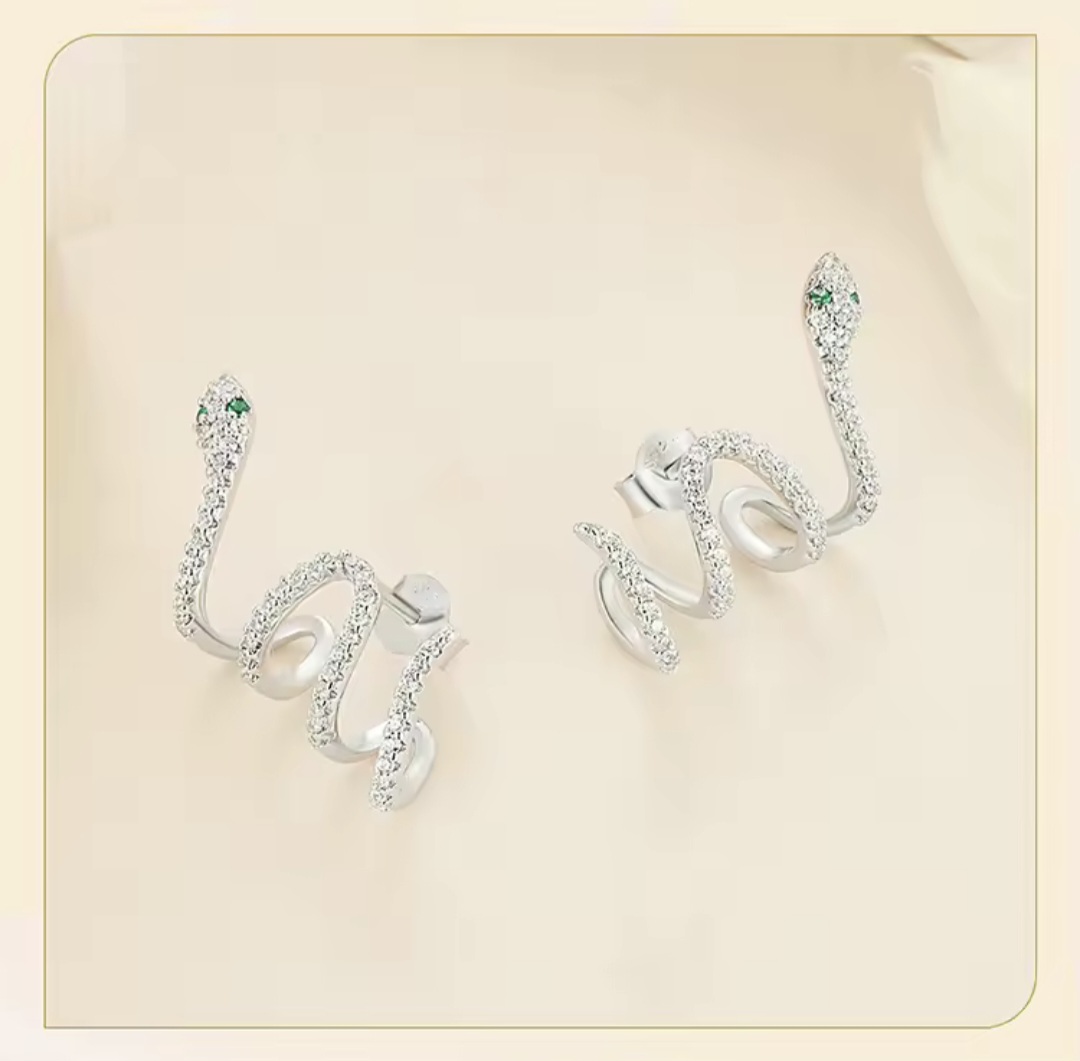 Сребърни обеци "Окото на кобрата"