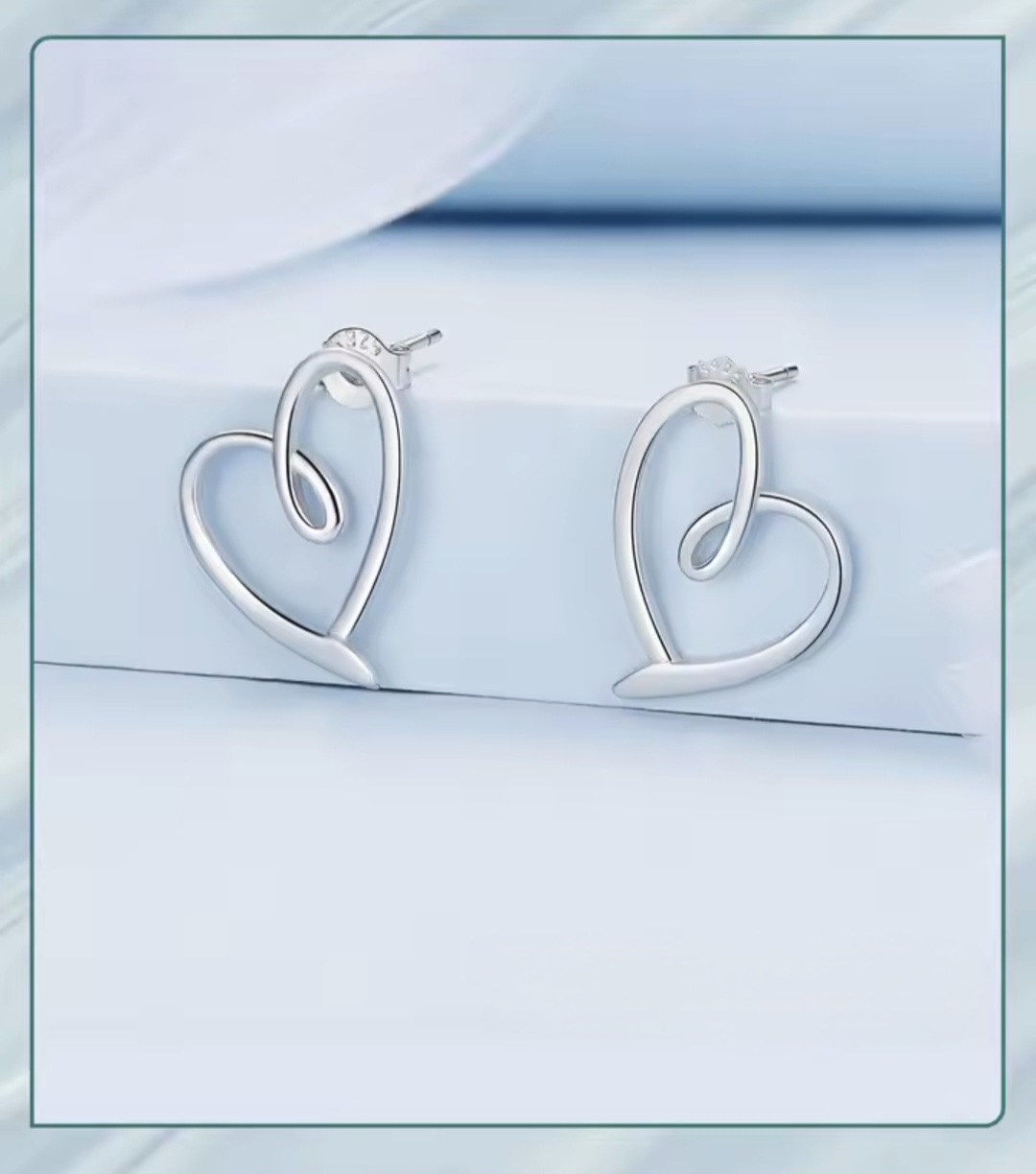 Сребърни обеци „Сърцето на нежността“